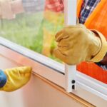 Team replacing windows